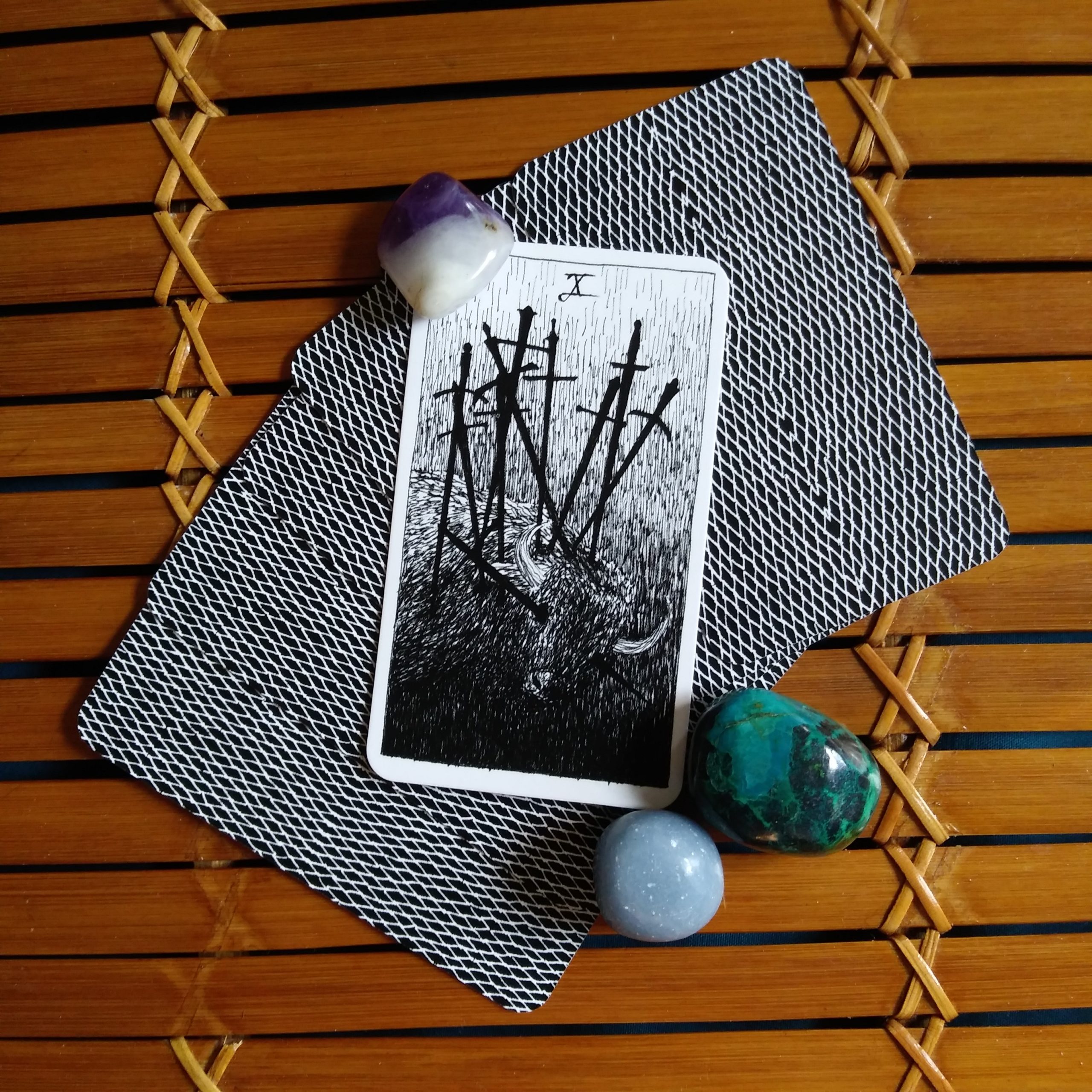 10 of Swords, Mini Wild Unknown Tarot, A message from the Universe