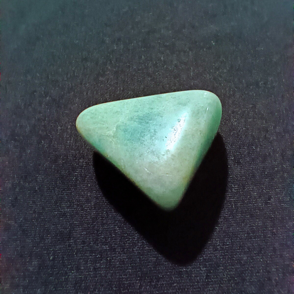 Amazonite Healing Crystal, Tumbled, 1 Stone, light bluish stone on black background, 1