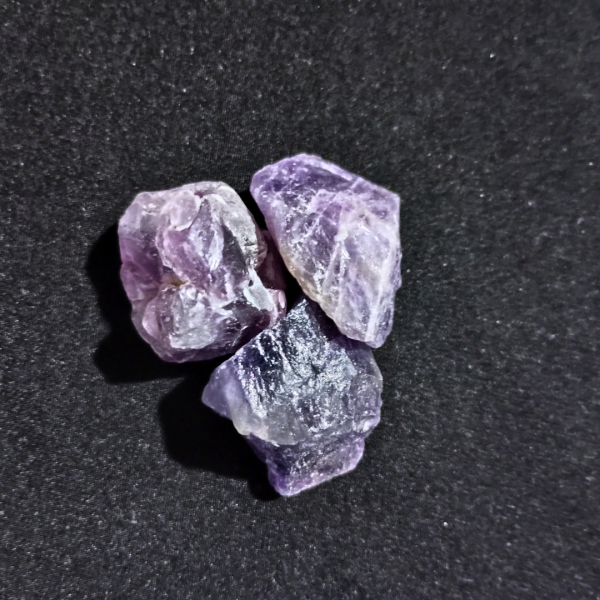 Amethyst Healing Crystal, Raw, 1 Stone, 3 stones on black background