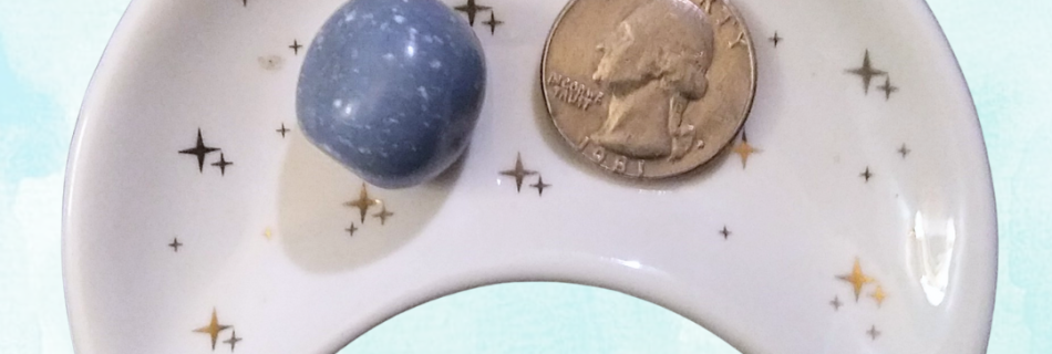 Angelite Healing Crystal, Tumbled, 1 Stone, ft image in moon-shaped dish on light background