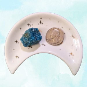 Apatite Healing Crystal, Raw, 1 Stone, in moon-shaped dish on light background