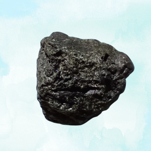 Black Tourmaline Healing Crystal, Raw, 1 Stone on light background