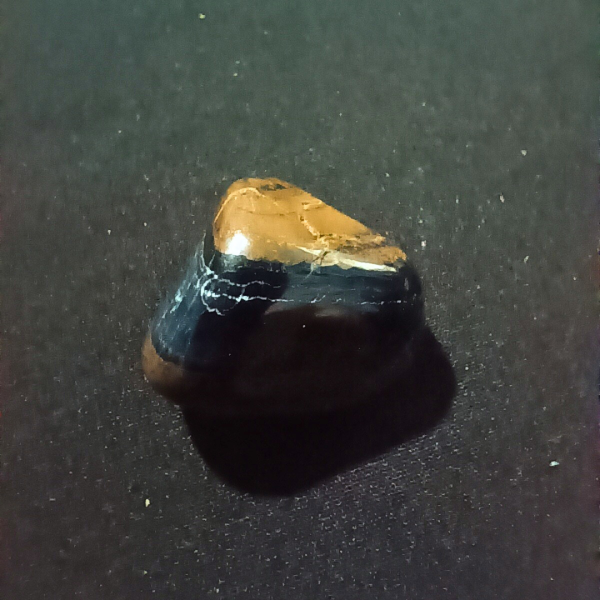 Blue Tigers Eye Healing Crystal, Tumbled, black background 1