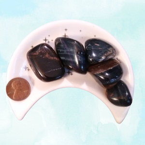 Blue Tigers Eye Healing Crystal, Tumbled, stones in moon-shaped dish with light background