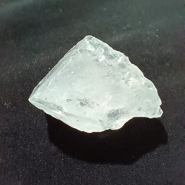 Clear Quartz Healing Crystal, Raw, 1 Stone on black background (1)