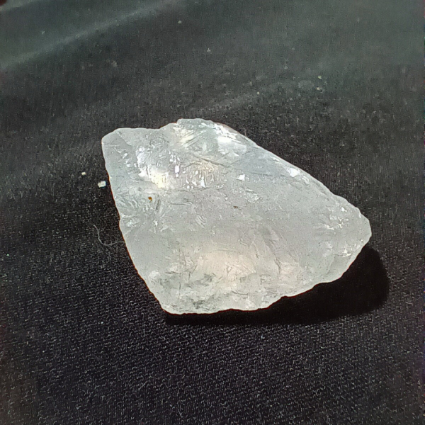 Clear Quartz Healing Crystal, Raw, 1 Stone on black background