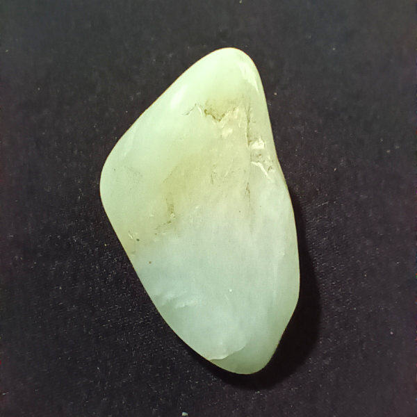 Jade Healing Crystal, Tumbled, 1 Stone on black background (1)