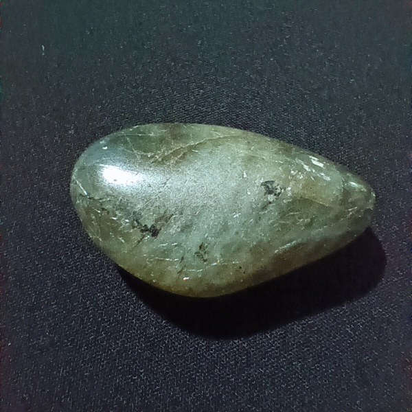 Labradorite Healing Crystal, Tumbled, 1 Stone on black background
