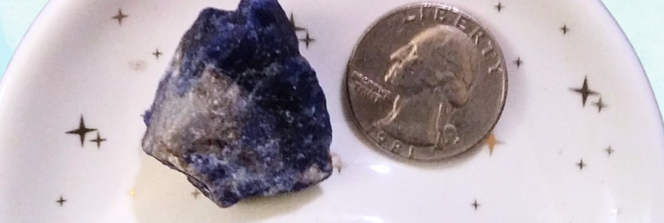 Lapis Lazuli Healing Crystal, Raw, 1 Stone in moon-shaped dish on light background (1)