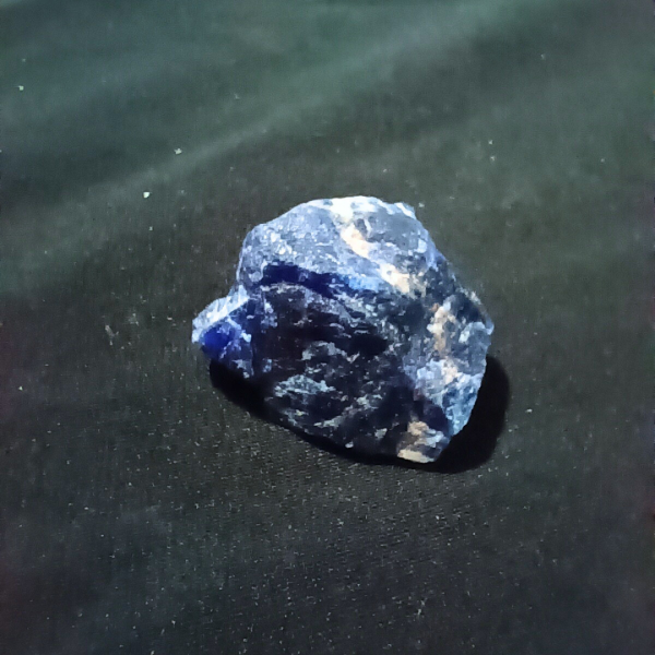 Lapis Lazuli Healing Crystal, Raw, 1 Stone on black background