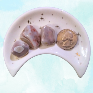 Pink Banded Agate Healing Crystal, Tumbled, 1 Stone, 3 stones in moon-shaped dish on light background