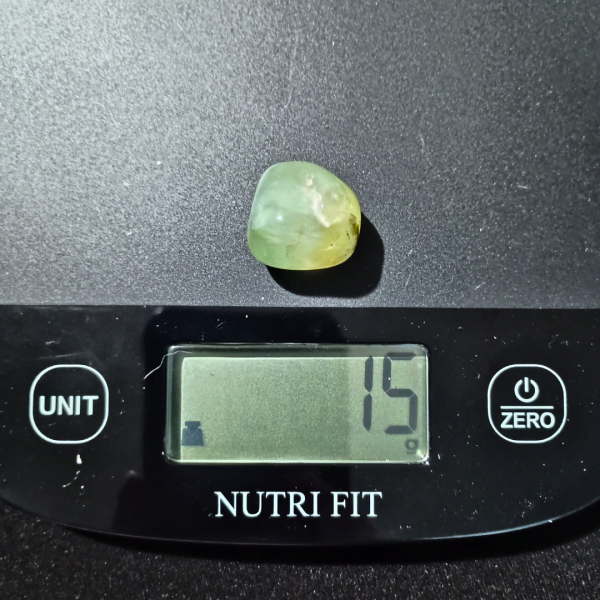 Prehnite Healing Crystal, Tumbled, 1 Stone on scale, 15 grams