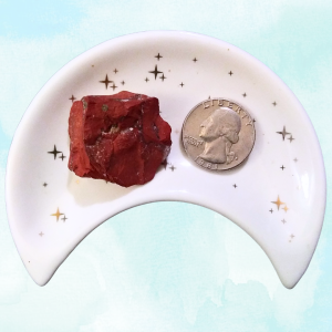 Red Jasper Healing Crystal, Raw, 1 Stone in moon-shaped dish on light background
