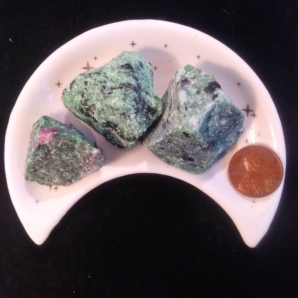 Ruby Zoisite Healing Crystal, Raw, 1 Stone, stones in moon-shaped dish, black background