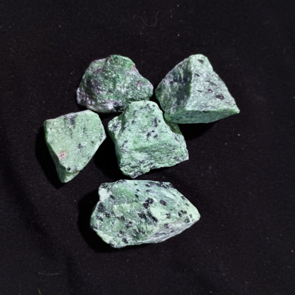 Ruby Zoisite Healing Crystal, Raw, 1 Stone, stones on black background