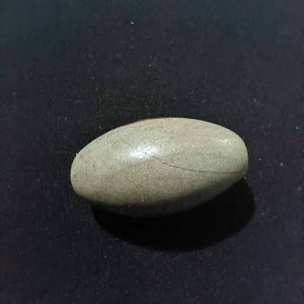 Shiva Lingam Healing Crystal, Tumbled, 1 Stone on black background