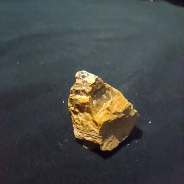 Tigers Eye Healing Crystal, Raw, 1 Stone on black background (2)