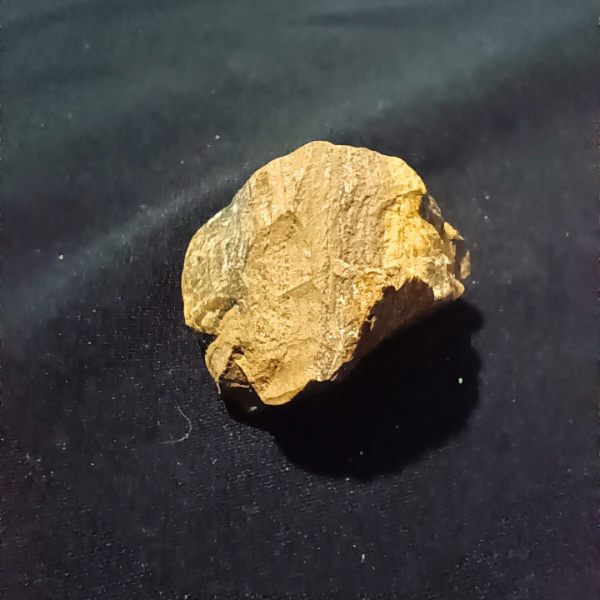 Tigers Eye Healing Crystal, Raw, 1 Stone on black background