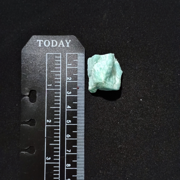 Amazonite Healing Crystal, Raw, 1 Stone, with ruler on black background, measuring about 3 cm