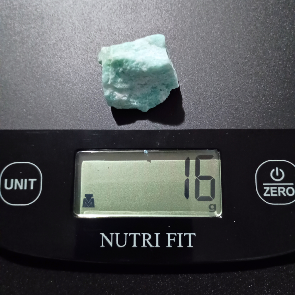 Amazonite Healing Crystal, Raw, 1 Stone, light bluish stone on scale, weight 16 grams