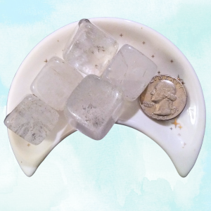 Clear Quartz Healing Crystal, Cube, 1 Stone, 5 stones in moon-shaped dish on light background
