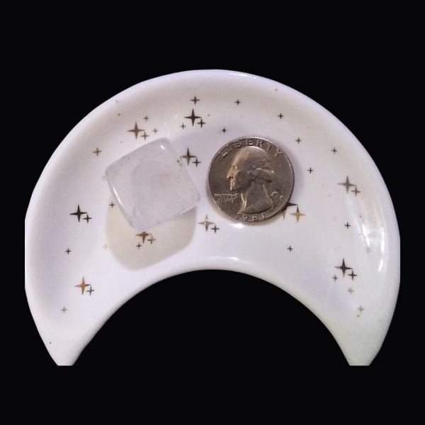 Clear Quartz Healing Crystal, Cube, 1 Stone, in moon-shaped dish on black background