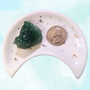 Green Strawberry Quartz Healing Crystal, Raw, 1 Stone in moon-shaped dish on light background