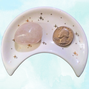 Rose Quartz Healing Crystal, Tumbled, 1 Stone in moon-shaped dish on light background