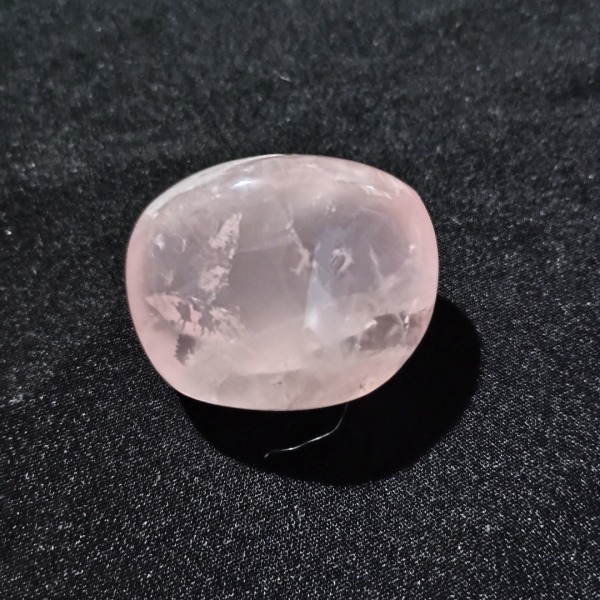 Rose Quartz Healing Crystal, Tumbled, 1 Stone on black background (1)