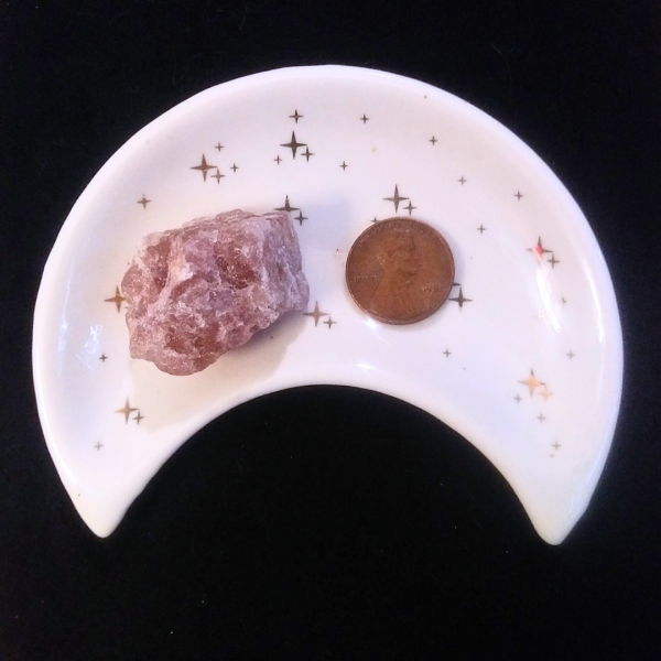Strawberry Quartz Healing Crystal, Raw, 1 Stone in moon-shaped dish on black background
