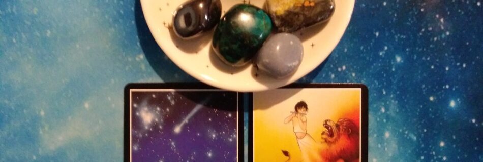 2 Osho Zen tarot cards and crystals on a starry blue background