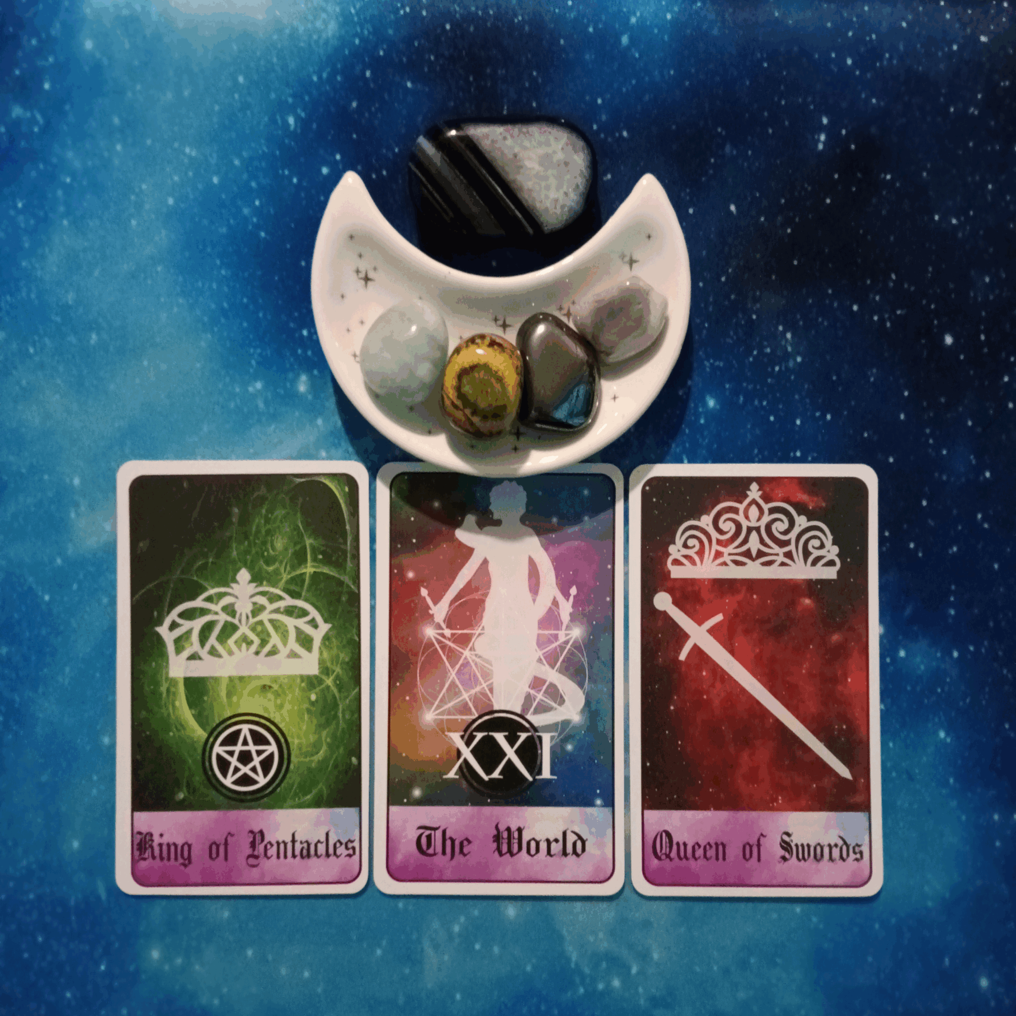 Closing Out A Big Chapter ~ A Message From the Universe, 3 Celestial Tarot cards and crystals on a starry blue background
