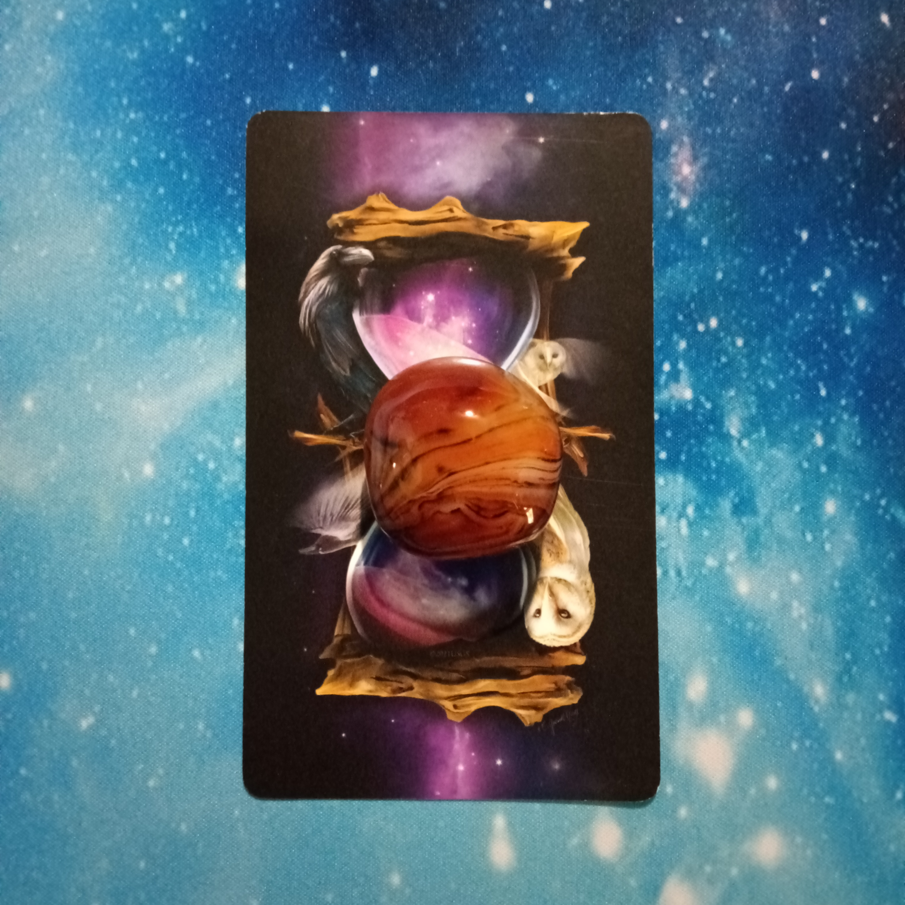 Full Moon Pick-a-Card Tarot Reading for May 2025! Witching Hour Oracle card and crystal, face down. Pile 1, Silk Agate (orange/brown)