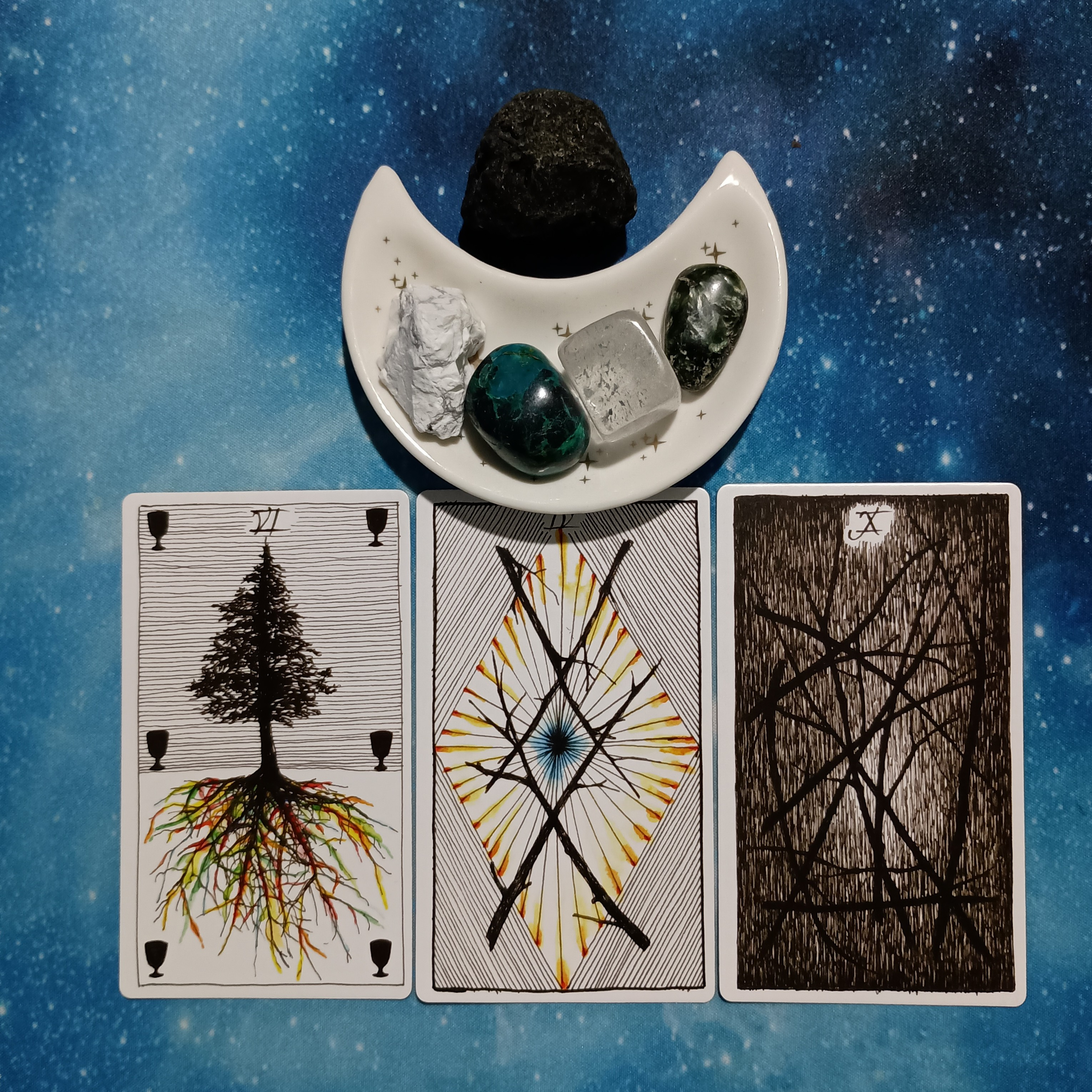 Time to Lighten Your Load!~ A Message From the Universe, 3 Wild Unknown Tarot cards and crystals on a starry blue background