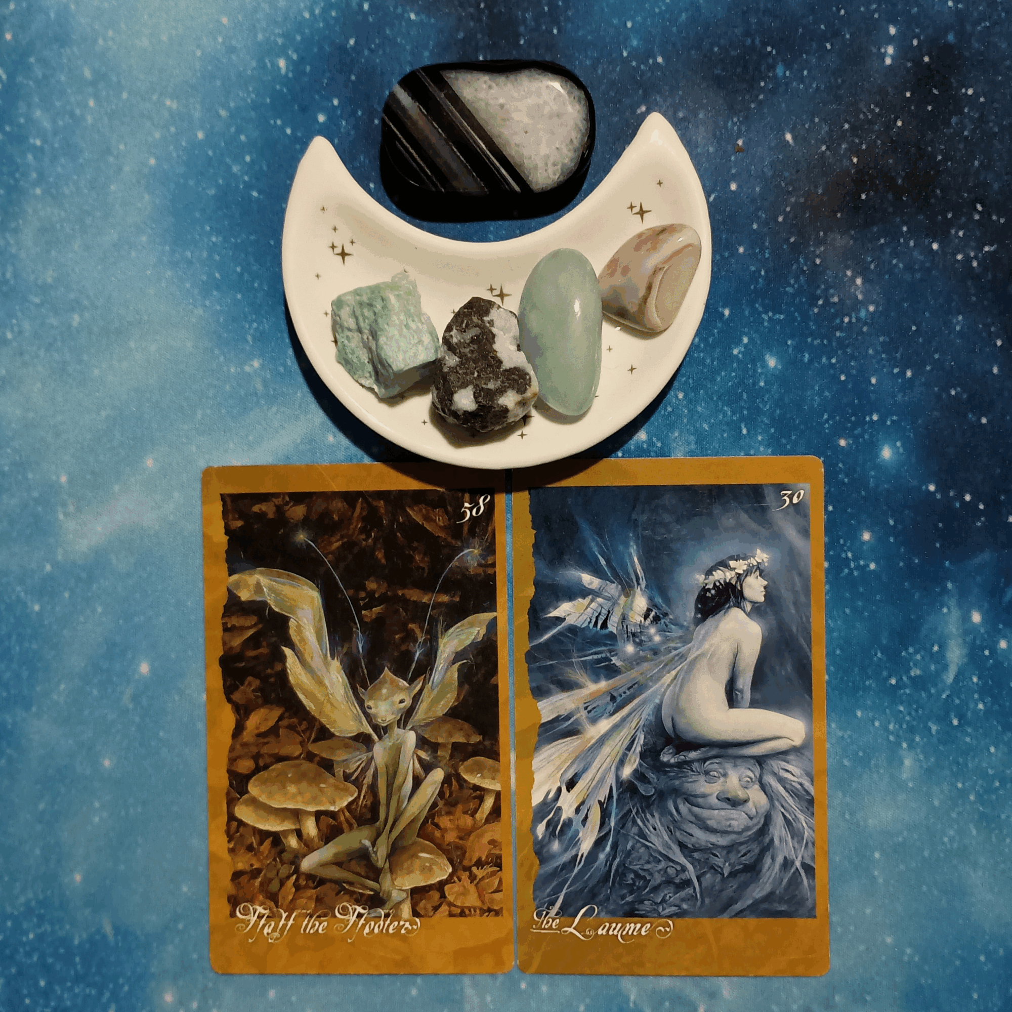 Giving Makes a Happy Heart! ~ A Message From the Universe, 2 Faeries' Oracle cards and crystals on a starry blue background