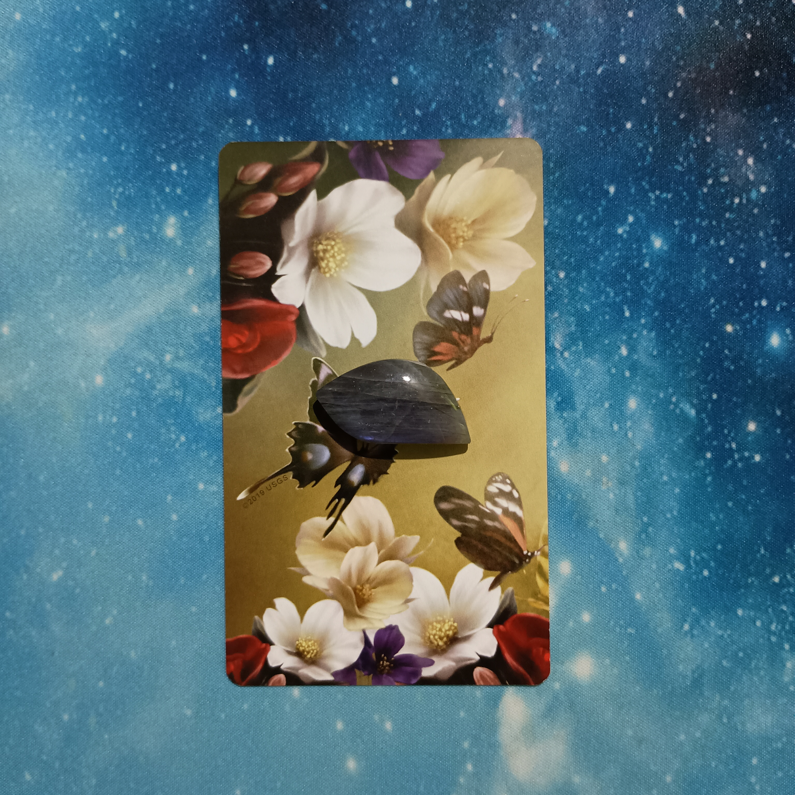Full Moon Pick-a-Card Tarot Reading for June 2025, Pile 4, Labradorite crystal on 1 Elle Qui oracle card, face down