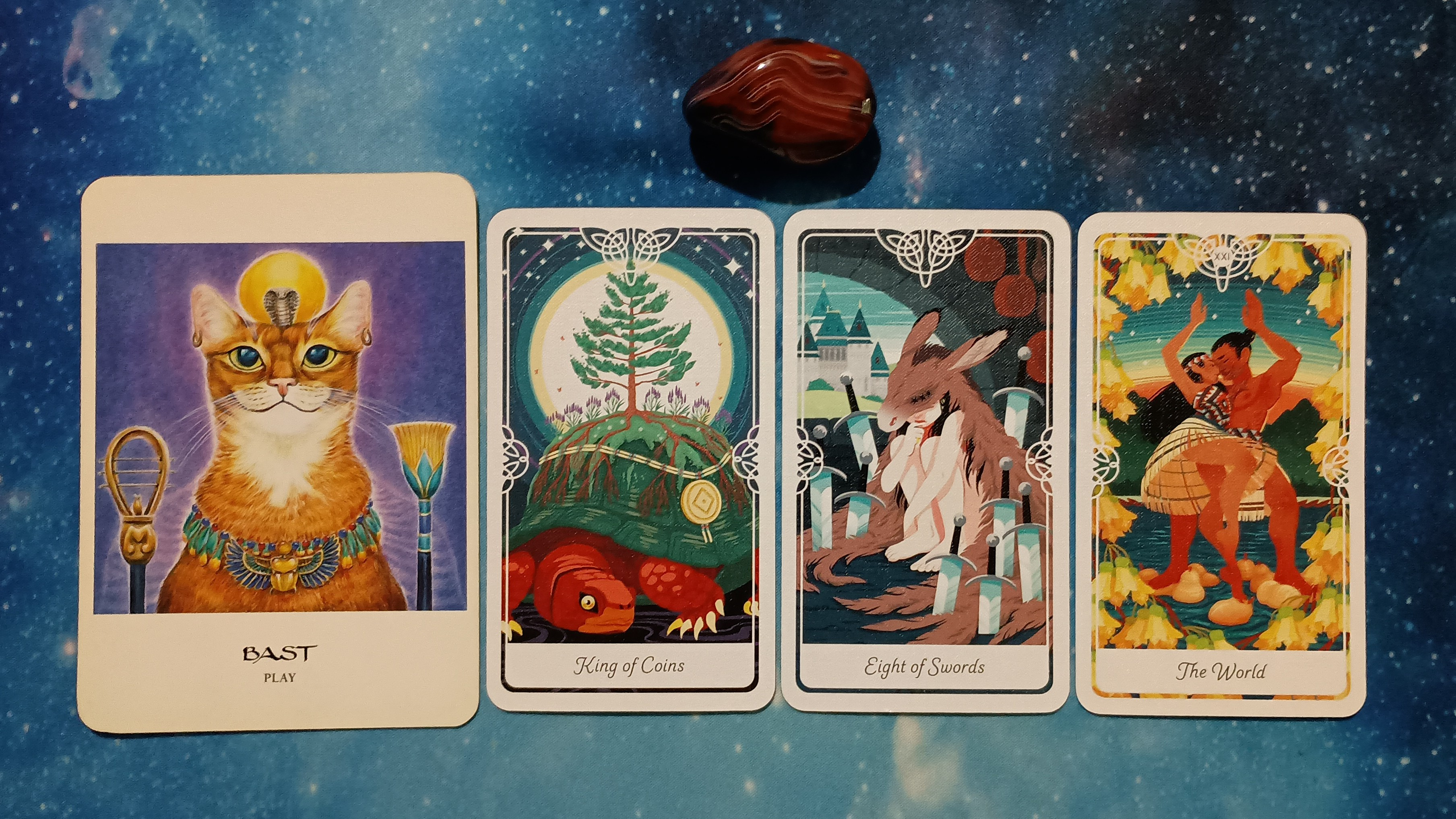 Full Moon Pick-a-Card Tarot Reading for July 2025, Pile 2, Silk Agate crystal, and 4 cards, face up