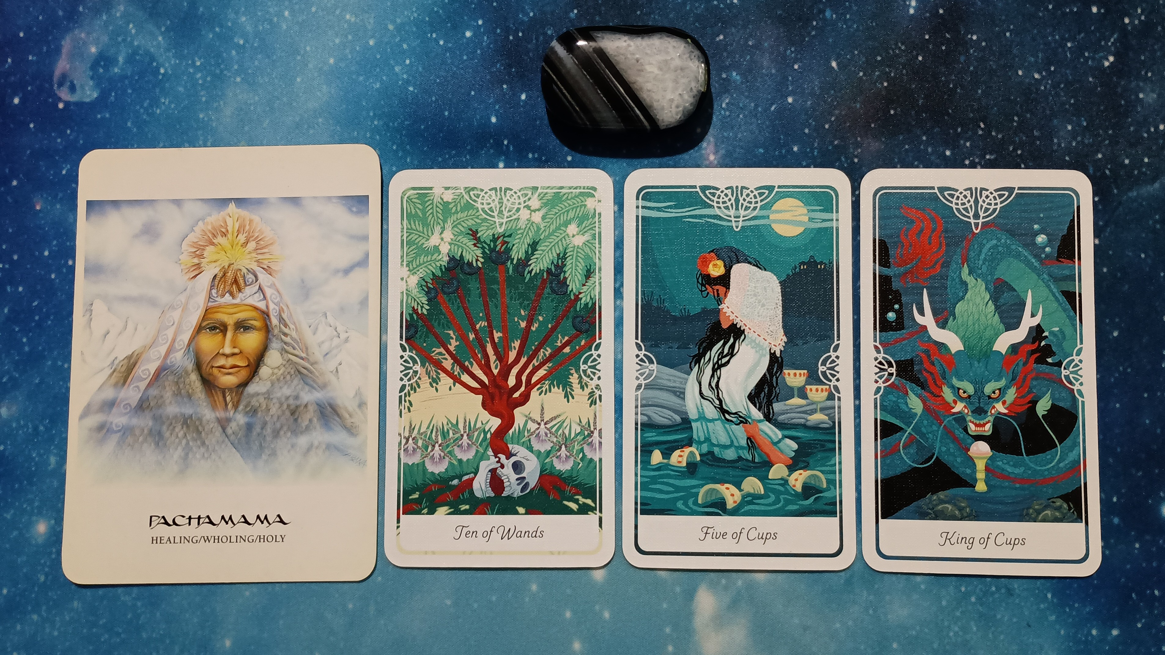 Full Moon Pick-a-Card Tarot Reading for June 2025, Pile 4, Black Agate crystal, and 4 cards, face up