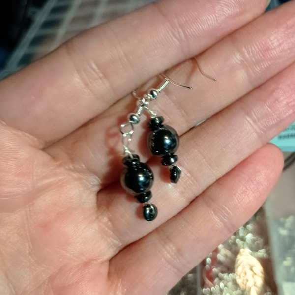 Inner Anchor Hematite Earrings for Protection and Grounding, hand 2
