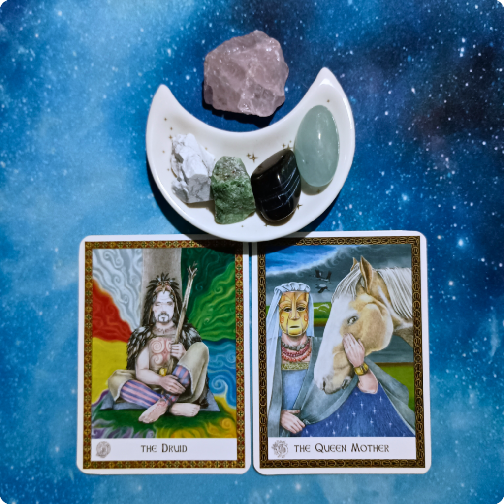 Balance and Extremes ~ A Message From the Universe, 2 Celtic Wisdom Oracle cards and crystals on a starry blue background
