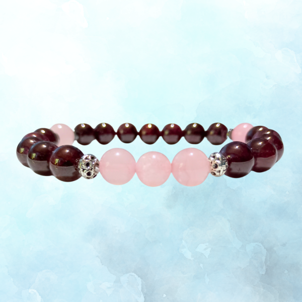 Beautiful Balance Rose Quartz & Garnet Bracelet, top view, blue BKG