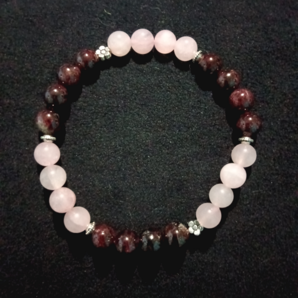 Cosmic Connection Rose Quartz & Garnet Bracelet for Unconditional Love, top view, black bkg
