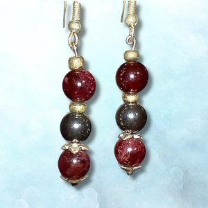 Grounded Flow: Garnet & Hematite Earrings for Stability & Change, ft image blue bkg
