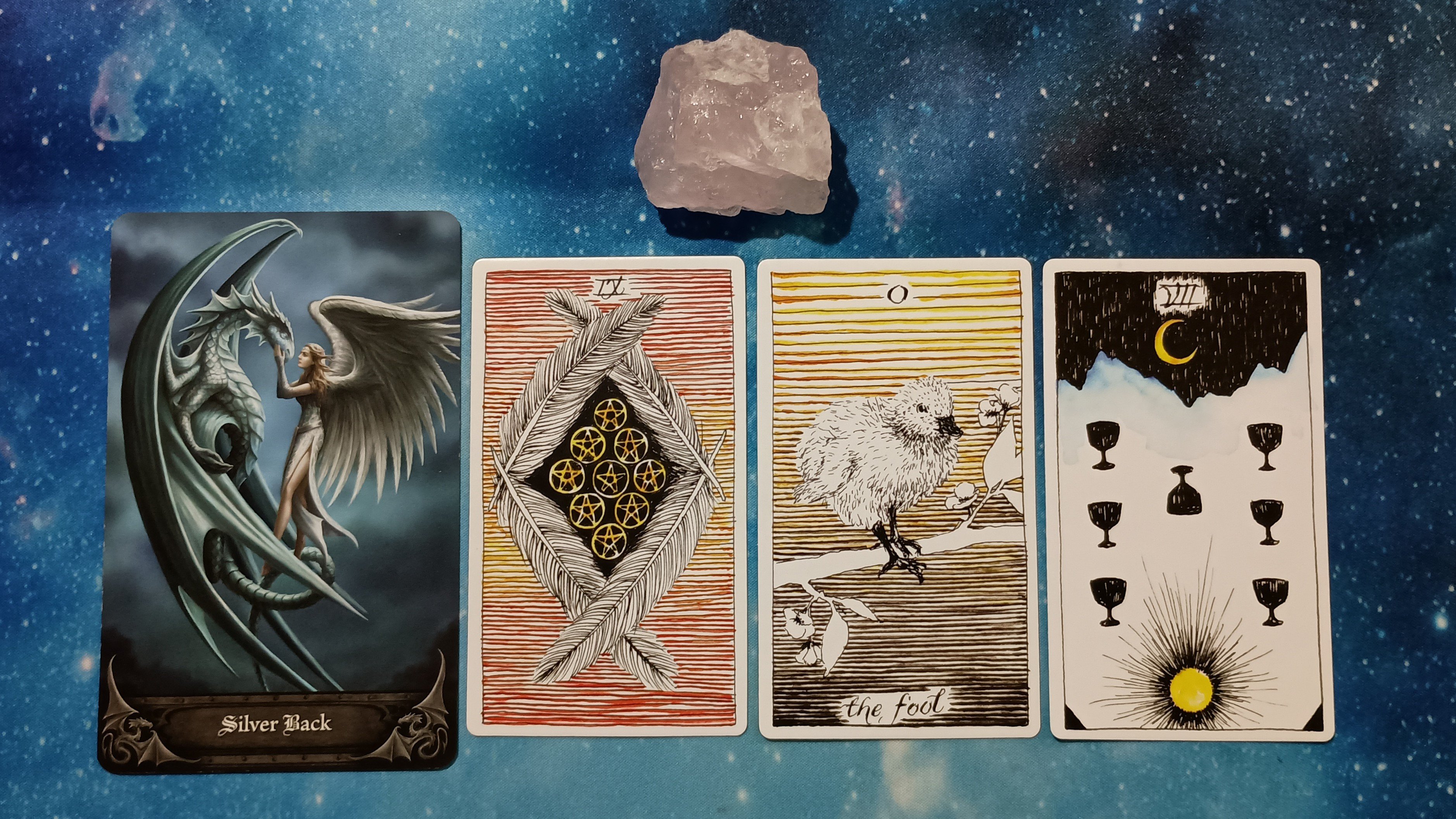 Full Moon Magic: Your August 2025 Pick-a-Card Tarot Reading, Pile 1, Rose Quartz crystal, and 4 cards, face up