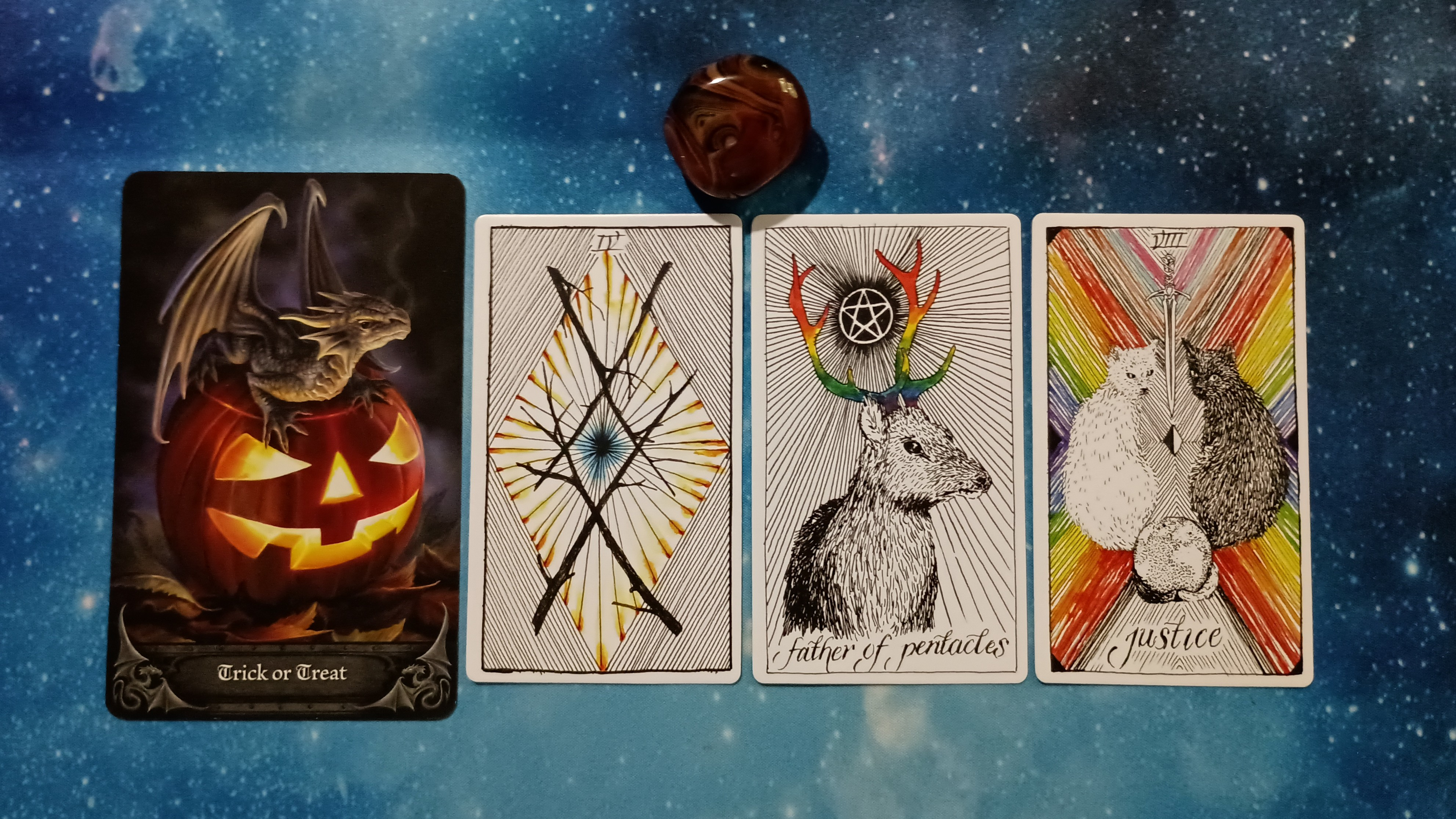 Full Moon Magic: Your August 2025 Pick-a-Card Tarot Reading, Pile 2, Silk Agate crystal, and 4 cards, face up