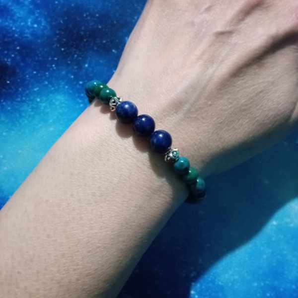 Intuitive Expression Azurite, Malachite, Sodalite & Lapis Lazuli Bracelet, wrist top view, blue background