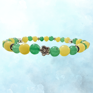 Manifesting Abundance: Lemon Jade & Green Aventurine Bracelet, ft image, blue background, side