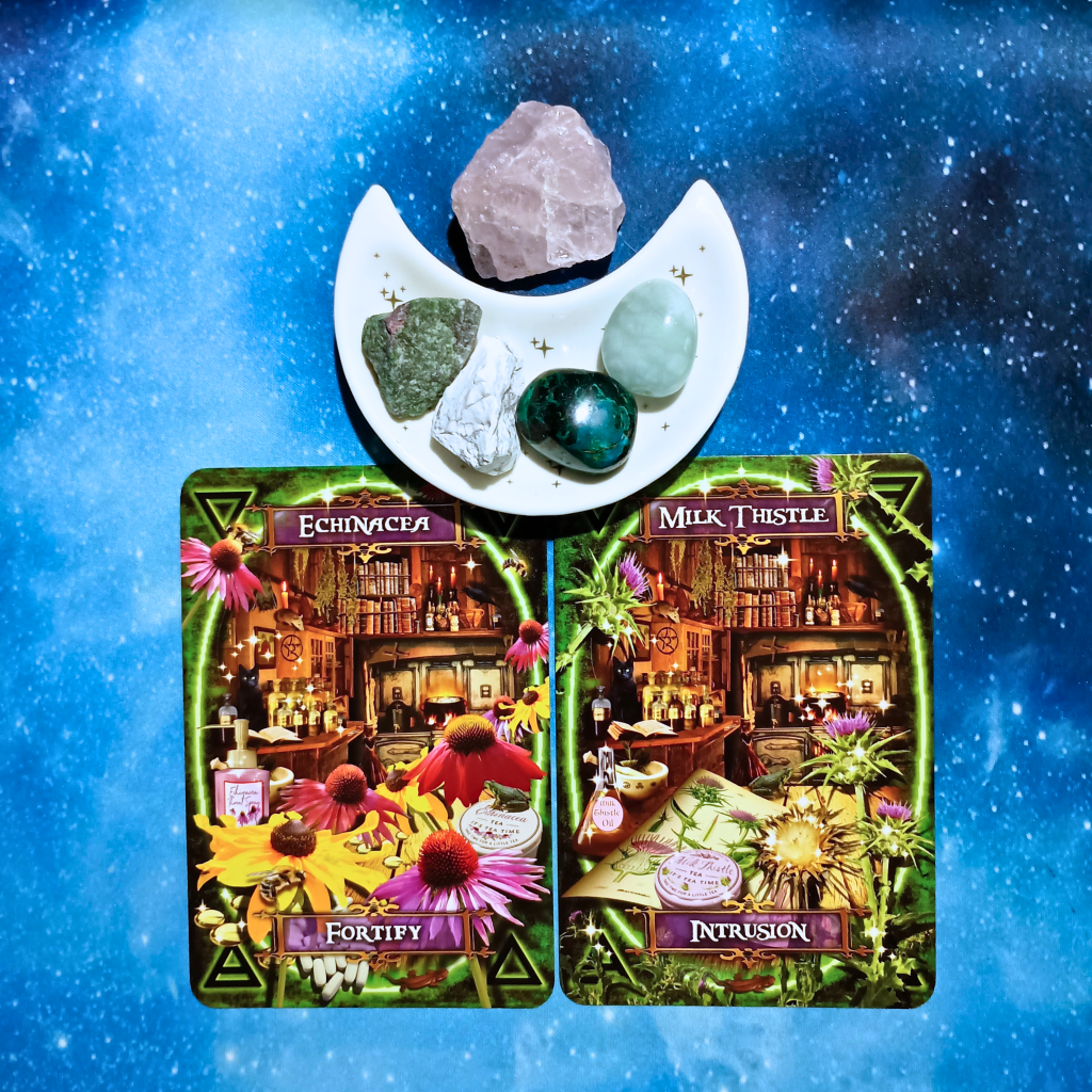 Finding Peace During Chaotic Times ~ A Message From The Universe, 2 Witches’ Kitchen Oracle cards and crystals on a starry blue background