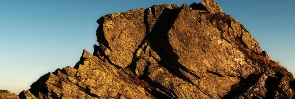 Struggle and Abundance A Message From the Universe, Person on top of a mountain, photo by eberhard grossgasteiger on Pexels,com