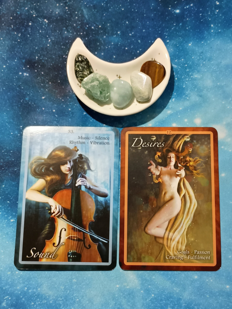 Life Goes On: A Message From the Universe, 2 Chakra Insight Oracle cards and crystals on a starry blue background